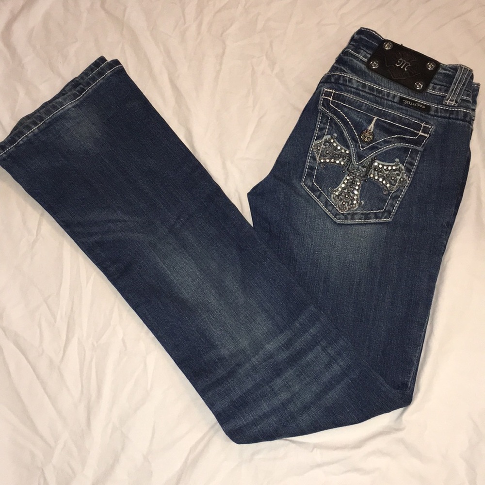 Once wore Miss Me Rhinestone cross jeans